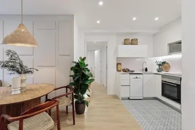 a bedroom with a bed and a large mirror at Pompei - 2 bedrooms, balcony and terrace in Ciutat Vella in Barcelona