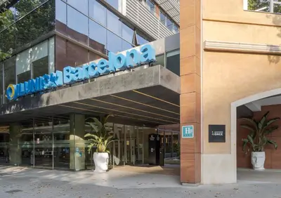 a building with a sign on the side of it at Ilunion Barcelona in Barcelona