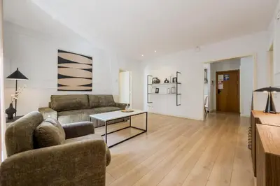 a bathroom with a tub and a toilet and a sink at Palau de la Musica Apartments in Barcelona