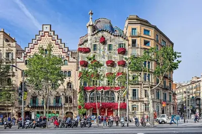 a building with flowers on the front of it at Canela Homes BARCELONA LIGHT in Barcelona