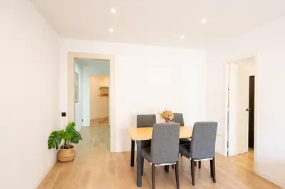 a dining room with a table and chairs at Beautiful apartment with terrace in Barcelona in Barcelona