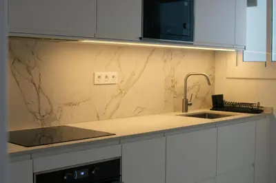 a kitchen with a sink and a counter top at Barcelona a 20 minutos en piso reformado y soleado in Gavà