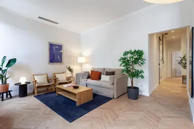 a living room with a couch and a table at Click&Flat Gaudi Dream II in Barcelona