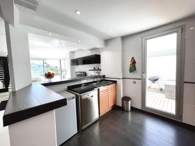a kitchen with a sink and a dishwasher at Casa espaciosa con piscina, aire acondicionado y jardín cerca de la playa de Vilanova - ES-332-9 in Sant Pere de Ribes