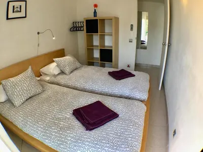 two beds sitting next to each other in a room at Apartamento Annie a 100 metros de la playa en Vilanova i la Geltrú, completamente equipado. - ES-332-3 in Vilanova i la Geltrú