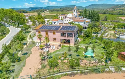 an aerial view of a house with solar panels on its roof at Beautiful Home In Guardiola De Fontrubí in La Guardiola