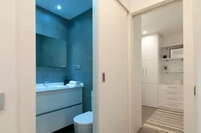 a bathroom with a toilet and a sink at Opening Doors Poblenou Beach in Barcelona