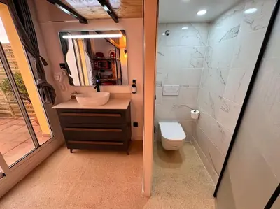 a small bathroom with a sink and a toilet at Precioso estudio con terraza en Florida E1 in Hospitalet de Llobregat