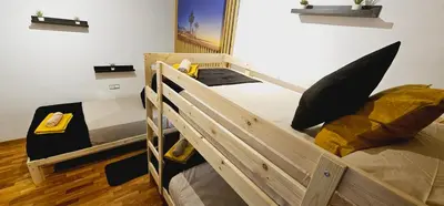 a bedroom with two bunk beds in a room at Apartamento exclusivo junto Sagrada Familia Barcelona in Barcelona