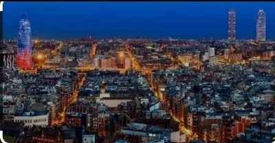 an aerial view of a city at night at Apartamento exclusivo junto Sagrada Familia Barcelona in Barcelona