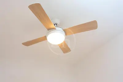 a ceiling fan with a light on a ceiling at Loft en Gracia II in Barcelona