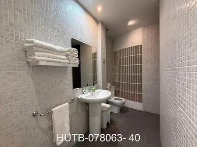 a bathroom with a sink and a toilet and a mirror at Palau de la música 3 in Barcelona