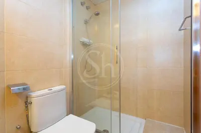 a laundry room with a washer and dryer in it at Cosy Apartment next to Sagrada Familia V in Barcelona