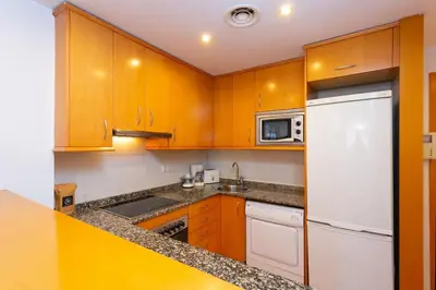 a living room with a couch and a table at Cosy Apartment next to Sagrada Familia V in Barcelona