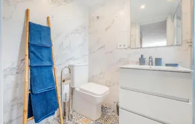 a bathroom with a toilet and a sink at Amazing Apartment In Sant Pere De Ribes in Sant Pere de Ribes