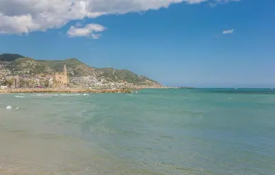 a view of the ocean with a beach and a city at Amazing Apartment In Sant Pere De Ribes in Sant Pere de Ribes