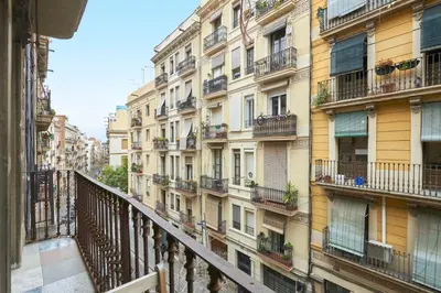 a view from a balcony of a building at 64 Apartment in a typical Barcelona's old building in Barcelona