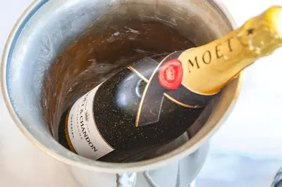 a bottle of wine in a pot of liquid at Infinity Jupi Sea in Sitges
