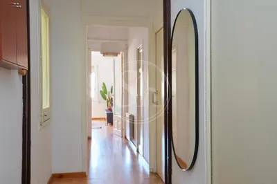 a mirror on a wall in a hallway at Huge Sagrada Familia in Barcelona