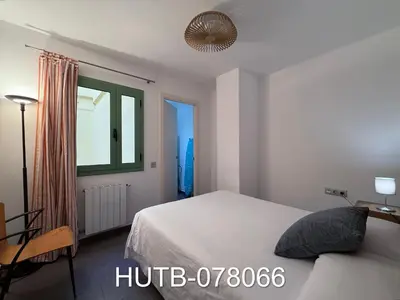 a bedroom with a bed and a window at Palau de la música 6 in Barcelona