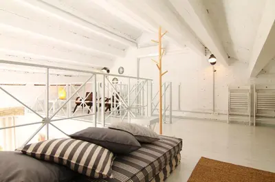 a bedroom with a bed in a room at Mediterrani Vacaciones perfectas y vistas al mar in Sitges