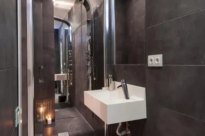a kitchen and dining room with a dining table at Key Plaza Cataluña Bliss in Barcelona