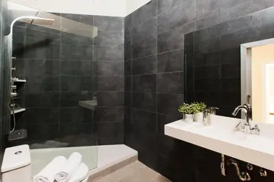 a room with two beds and a window at Key Plaza Cataluña Bliss in Barcelona