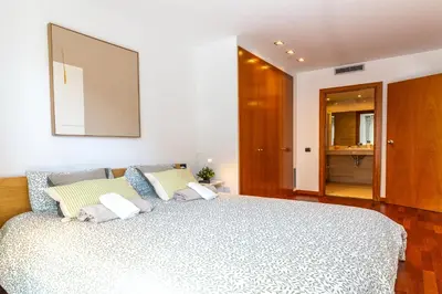 a bedroom with a large bed in a room at Lovely apartment Sagrada Familia in Barcelona