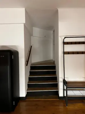 a staircase in a room with a stair case at Loft en Gracia in Barcelona