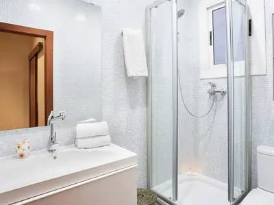 a bathroom with a shower and a sink and a toilet at Apartment in Barcelona near Seabeach in Barcelona