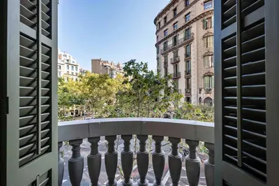 a view of a city from a balcony at The Diagonal Suites by Sweett in Barcelona