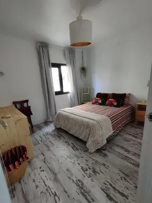 a bedroom with a bed and a window at Apartment Barca 1 Camp Nou in Hospitalet de Llobregat