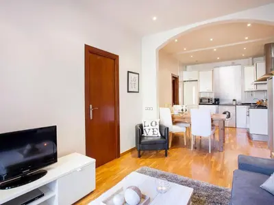 a living room with a couch and a table at Premium apartment in Barcelona in Barcelona