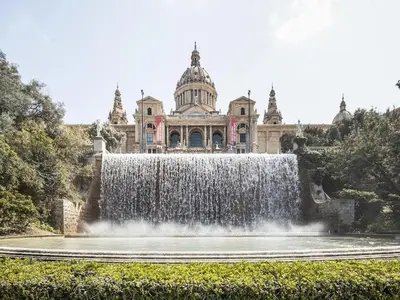 a water fountain in front of a building with a building at Premium apartment in Barcelona in Barcelona
