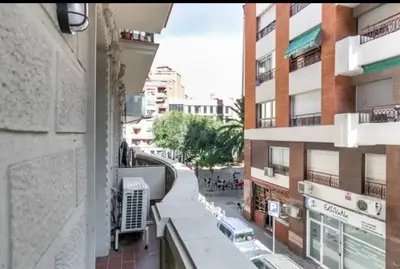 a view of a city street from a building at Stylish apartment in Plaça Espanya in Barcelona
