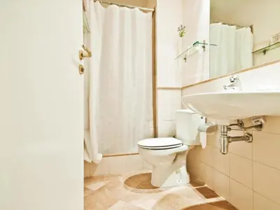 a bathroom with a toilet and a sink at Apartamento con 2 Dormitorios, Elegante y Céntrico en Rambla Catalunya - ES-341-2 in Barcelona