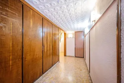 a hallway with wooden walls and a ceiling at Sweett - Atic Gracia in Barcelona