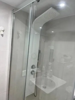a bathroom with a shower with a sink at CASA CON JARDIN, SAUNA, PISCINA PRIVADA y NATURALEZA CERCA DE BARCELONA in Pallejá