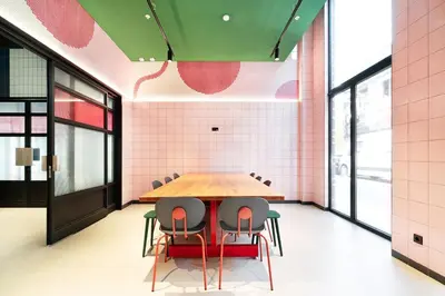 a conference room with a wooden table and chairs at Residencia & Coliving para Postgrads in Barcelona