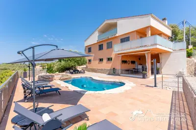a fish hanging on a wall with a coffee place sign at Amazing views Villa Alizee with private pool sea views and Air Conditioning in Olivella