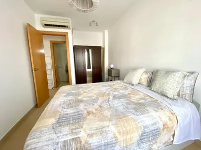 a bedroom with a large bed in a room at Tranquilo y con terraza in Terrassa
