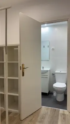 a bathroom with a toilet and a sink at Hostal Oliveta Budget in Barcelona
