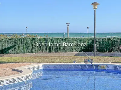 a swimming pool with the words open into barbados at Apartamento marítimo en Cubelles - OI01958 in Cubelles