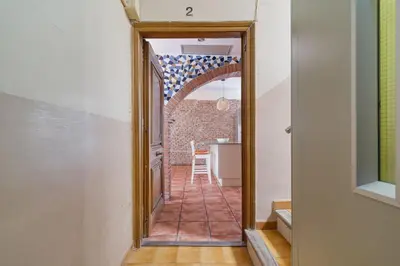 a hallway with a mirror in a room at GuestReady - Un pequeño paraíso en Barcelona in Barcelona