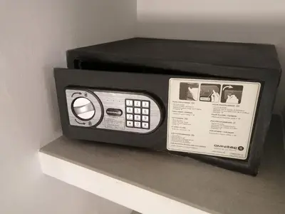 a microwave sitting on top of a shelf at La Fira - Paralelo 1 in Barcelona