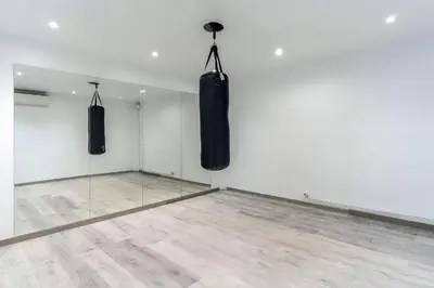 a room with two punching bags hanging on the wall at 4235 - AB Santa Coloma 3 B-I in Santa Coloma