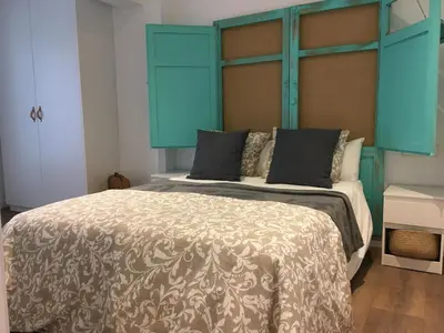 a closet with a chain link fence at Loft reformado in Cornellà de Llobregat