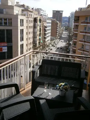 a balcony with a table and chairs on a balcony at Marbel 2 in Barcelona