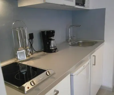 a kitchen with a sink and a counter top at Marbel 2 in Barcelona