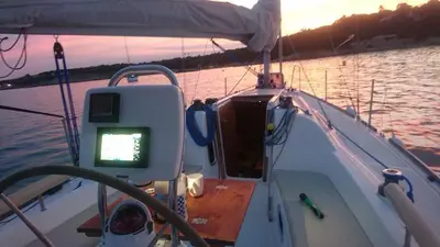a boat with a tv on the front of it at Velero Viko S30 in Sitges